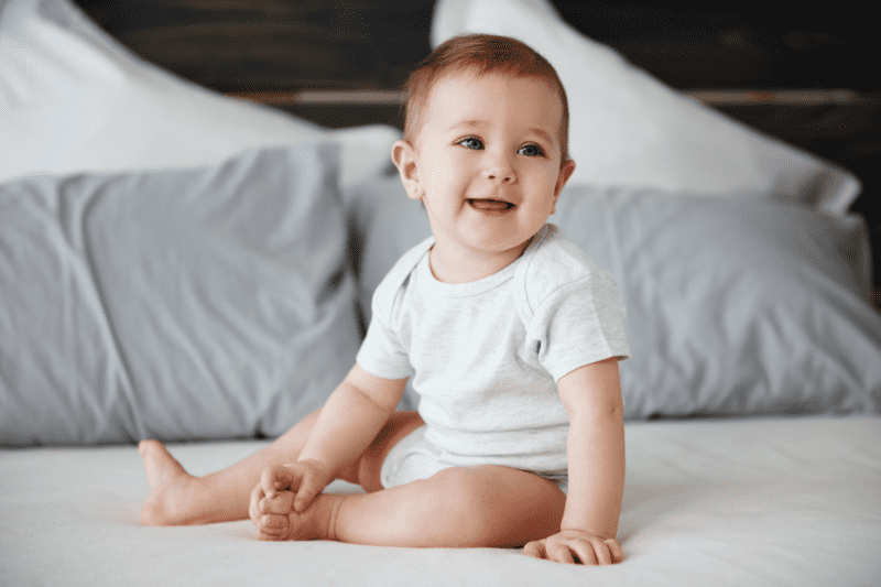 smiling-baby-sitting